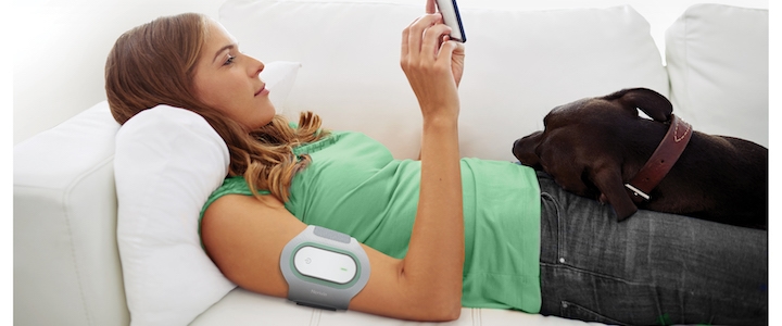 Woman-Using-Theranica.jpg Research Reinforces Alternatives to Medication in Migraine Care