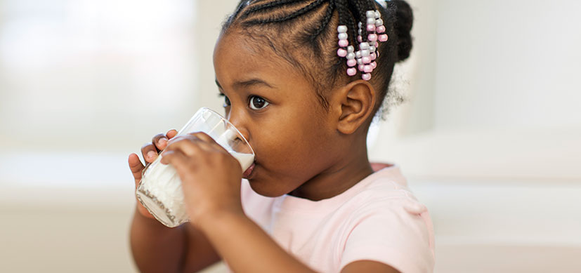 girl-drinking-milk.jpg Children with Private Insurance More Likely to Outgrow Food Allergies