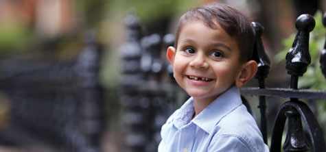Little boy smiles.