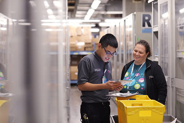 Two employees working together.